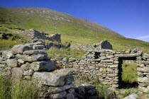 Ireland, County Mayo, Achill Island, Slievemore Deserted Village on the slopes of Slievemore Mountain.
