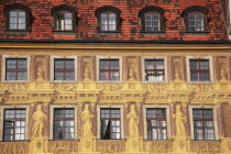 Poland, Wroclaw, detail of building facade with tromp l'oiel painted mural in the Rynek old town square.