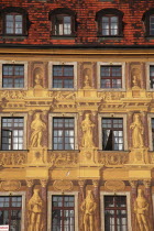 Poland, Wroclaw, detail of building facade with tromp l'oiel painted mural in the Rynek old town square.