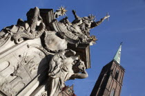 Poland, Wroclaw, baroque statue of St Jan Nepomucen St John Nepomuk made in sandstone by Johann Georg Urbansky in 1732 in front of the Church of the Holy Cross and St Bartholomew.