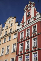 Poland, Wroclaw, pastel coloured building facades in the Rynek old town square.