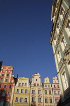 Poland, Wroclaw, pastel coloured building facades in the Rynek old town square.