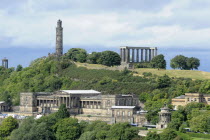 Scotland, Lothian, Edinburgh, View from Arthurs Seat of Calton Hill with Admiral Lord Nelsons tower and unfinished Parthenon, National Monument, Royal High School buildings below.