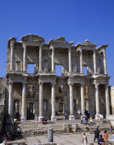 Turkey, Ephesus, Library of Celsus with tourists.