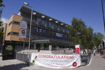 Ireland, North, Belfast, University Road, Exterior of the Queens University Students Union building with graduation congratualtions banner.