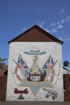 Ireland, North, Belfast, Donegall Pass, Loyalist poltical mural on a gable wall commemorating Reverend Robert Bradford.