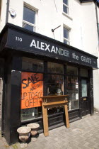 Ireland, North, Belfast, Donegall Pass, Alexander the Grate fireplace shop with sign displayin 50% sale.