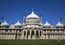 England, East Sussex, Brighton, The Royal Pavilion, 19th century retreat for the then Prince Regent, Designed by John Nash in a Indo Sarascenic style, tourist photographing herself and onion domes.