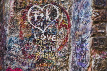 Italy, Veneto, Verona, Casa di Giulietta or Juliets House, Graffiti and messages of love on wall at entrance to courtyard of No. 27 Via Cappello.