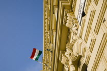 Hungary  Pest county  Budapest, Renovated facade on Pest bank of Danube with Hungarian flag.