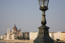 Hungary, Pest County, Budapest, detail of Szechenyi Chain Bridge or Memory Bridge with Hungarian Parliament Building seen behind on Pest bank of the River Danube.