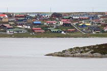 Falkland Islands, Stanley, Residential housing overlooking Stanley Bay, red and green roofs single and double-storey units.