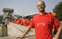 Hungary, Pest County, Budapest, participant in charity walk in aid of Alzheimers disease sufferers at Memory Bridge also known as the Chain Bridge.