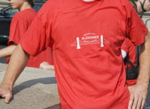 Hungary, Pest County, Budapest, cropped view of participant in charity walk in aid of Alzheimers disease victims at Memory Bridge also known as the Chain Bridge.