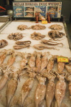 Greece, Attica, Athens, Central market, Display of fresh squid and octopus.