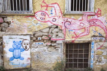 Greece, Attica, Athens, Graffiti on wall of building in the Plaka which lies beneath the Acropolis.