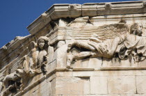 Greece, Athens, Tower of the Winds. Part view of octagonal Pentelic marble Roman clocktower on the Agora with detail of carved frieze depicting the gods of the winds. horologion  (timepiece), is a...