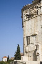 Greece, Athens,Tower of the Winds on the Agora in Athens. Part view of octagonal Pentelic marble clocktower with detail of carved frieze depicting the gods of the winds.  