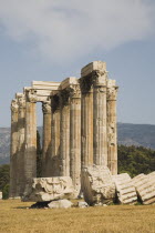 Greece, Athens, The Temple of Olympian Zeus, corinthian columns, capitals and architraves of ruined temple dedicated to king of the Olympian gods, Zeus.  