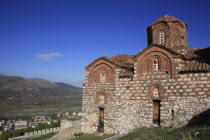 Albania, Berat, St Triada Church on the right with Berat new town beside the River Osum in the background.