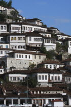 Albania, Berat, houses built on hillside on the banks of the River Osum.
