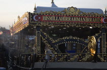 Turkey, Istanbul, Sultanahmet, Traditional fish restaurant boat on the Golden Horn adjacent to Galata with highly decorative black and gold detail to structure. 