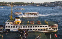 Turkey, Istanbul, Sultanahmet, Bosphorous ferry at sunset with Hagia Sophia behind.