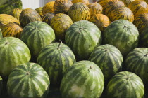 Turkey, Aydin Province, Kusadasi, Fresh green and yellow striped melons delivered to the head chef at Hotel Ladies Beach. 