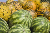 Turkey, Aydin Province, Kusadasi. Fresh green and yellow striped melons delivered to the head chef at Hotel Ladies Beach. 