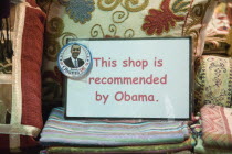 Turkey, Istanbul, Sultanahmet. Shop advertising using President Obamas image as recommendation in The Spice Bazaar or Egyptian Bazaar, one of the oldest bazaars in the city and the second largest cove...