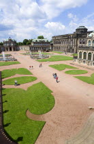 GERMANY; Saxony; Dresden; The  central Courtyard of the restored Baroque Zwinger Palace gardens busy with tourists originally built between 1710 and 1732 after a design by Matthus Daniel Pppelmann i...