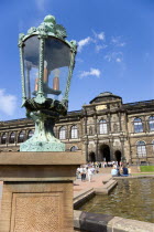 GERMANY, Saxony, Dresden, The central Courtyard and Picture Gallery of the restored Baroque Zwinger Palace gardens busy with tourists originally built between 1710 and 1732 after a design by Matthus...