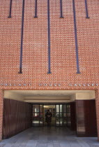 England, West Sussex, Chichester, Pallant House Art Gallery, tourist exting the new wing.