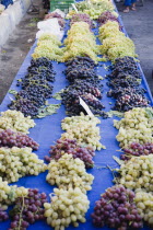 Turkey, Aydin Province, Kusadasi, Grapes for sale on street stall in weekly market stall. Azirince is the nearby wine producing region.