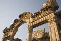 Turkey, Izmir Province, Selcuk, Ephesus, Detail of carved archway and supporting columns in antique city of Ephesus on the Aegean sea coast.