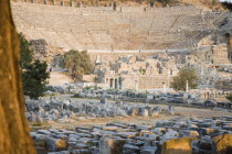 Turkey, Izmir Province, Selcuk, Ephesus, Theatre and ruined buildings in antique city of Ephesus on the Aegean sea coast.
