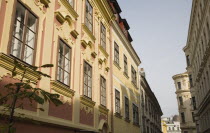 Austria, Vienna, Renovated exterior facades of pastel painted buildings.