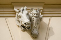 Austria, Vienna, Neubau District of Vienna, Decoration on MuseumsQuartier depicting horses head and heraldic lion. The Museum Quarteirs housed in the former Imperial Stalls which were converted into a...