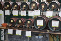 Austria, Vienna, The Naschmarkt, Display of barrels of wine for sale from the cask.
