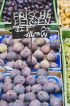 Austria, Vienna, The Naschmarkt, Fresh figs for sale on market fruit stall display.