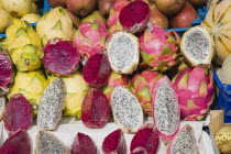 Austria, Vienna, The Naschmarkt, Dragon Fruit for sale on market stall.  Genus Hylocereus, sweet pitayas.
