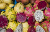 Austria, Vienna, The Naschmarkt, Exotic fruit for sale on market stall. Genus Hylocereus, sweet pitayas, commonly known as dragon fruit.