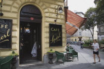 Austria, Vienna, Mariahilf District, Cafe Sperl the preferred cafe of Adolf Hitler. Exterior with waitress carrying coffee order.