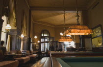 Austria, Vienna, Mariahilf District, Cafe Sperl, the preferred cafe of Adolf Hitler. Interior with billiard tables in foreground and customers sitting in window alcoves. Established for over 120 years...