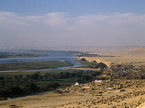Egypt, Nile Valley, Beni Hassan, View over Muslim Cemetary tword the fertile River Nile Flood Plain.