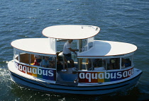 Canada, British Columbia, Vancouver, Tourists on Aquabus tour.