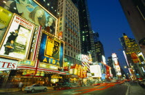 USA, New York State, New York City, Manhattan, Times Square colourfullfy illuminated at night with neon theatre signs.