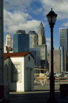 USA, New York, New York City, Lower Manhattan, Financial District seen from Fulton Landing in Brooklyn.
