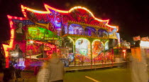 Entertainment, Funfairs, Rides, illuminated at night.