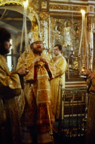 Russia, Moscow, Russian Orthodox religious service in a church.